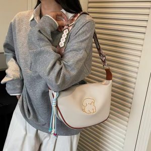 Women's yellow leather crossbody bag, cute puppy print, adjustable shoulder strap, stylish everyday handbag